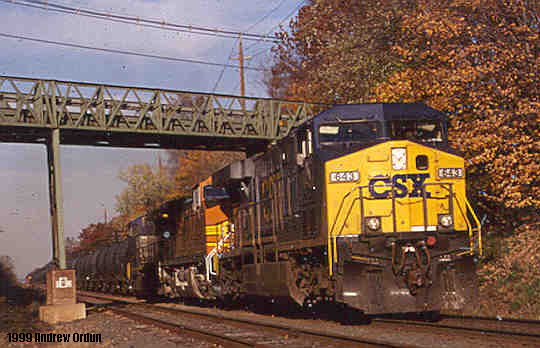 CSX Q41705 rumbles south through Skillman on Trenton Line with CSX 643/BNSF 4550/CSX 229 and 160 cars on November 5, 1999.
